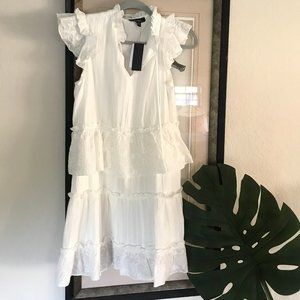 Lea & Viola white mini dress with lace detailing and a tiered mini skirt